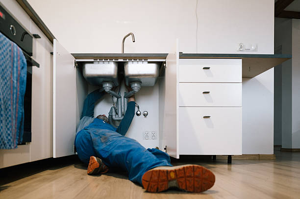 Professional Plumbing technician working in Dellroy, OH